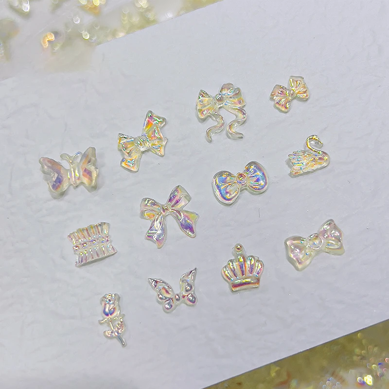 50 pezzi Auroras in resina trasparente con fiocco a forma di cuore per nail art, simpatico orso, farfalla, glitter, decorazione per unghie, accessori per gioielli