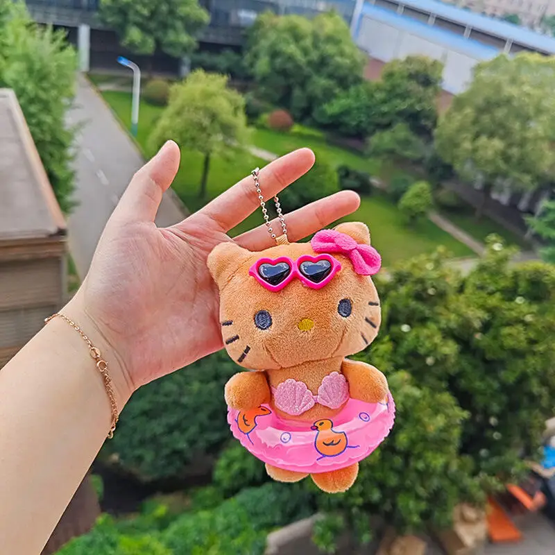 Sanrio Hellokitty Peluche Ornamento Cartone Animato Kawaii Hawaiano in Pelle Nera Peluche Ciondolo per Auto Studente Zaino Portachiavi Regalo per Bambini