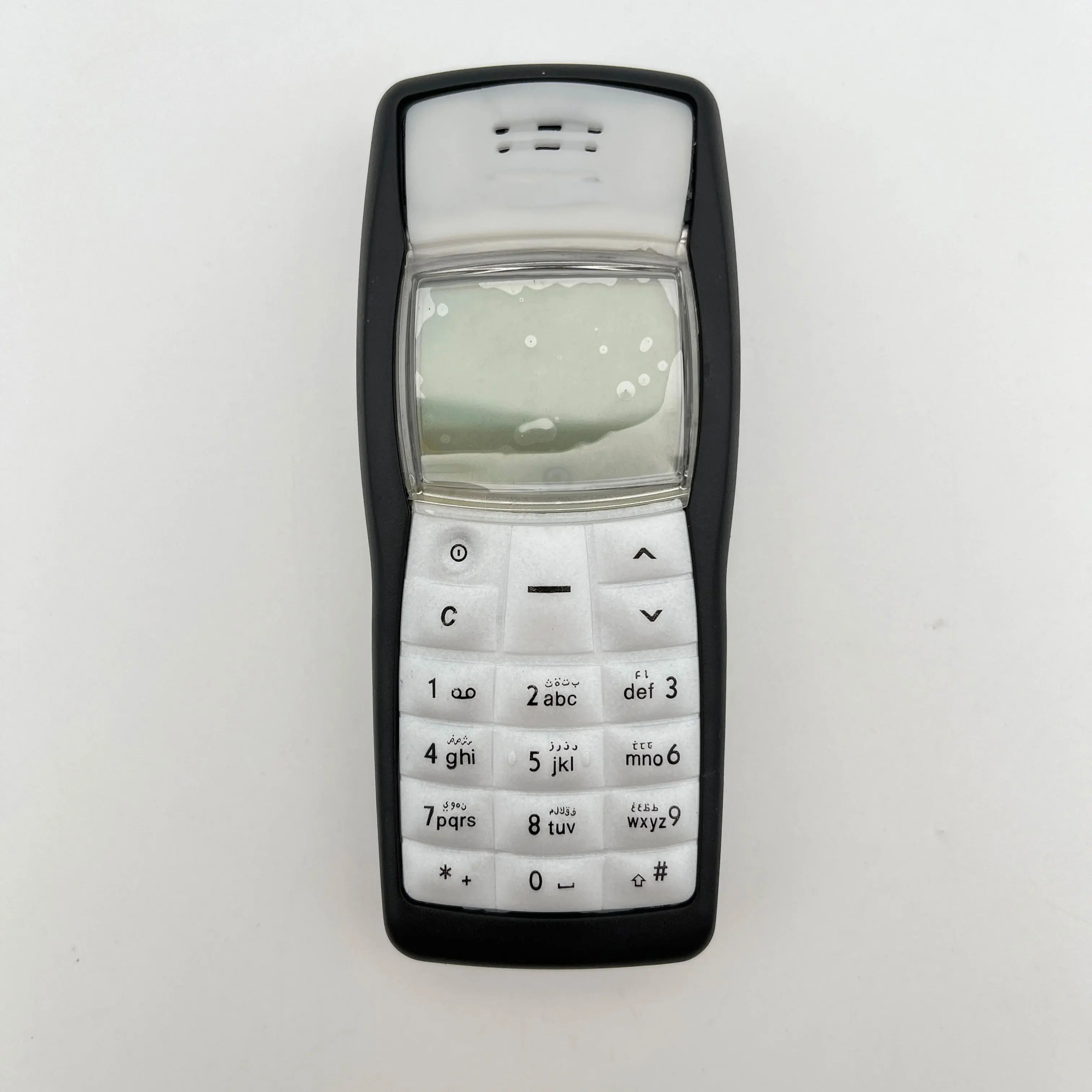 هاتف محمول أصلي 1100 مصنوع في فنلندا يدعم اللغة الإنجليزية وحالة جيدة