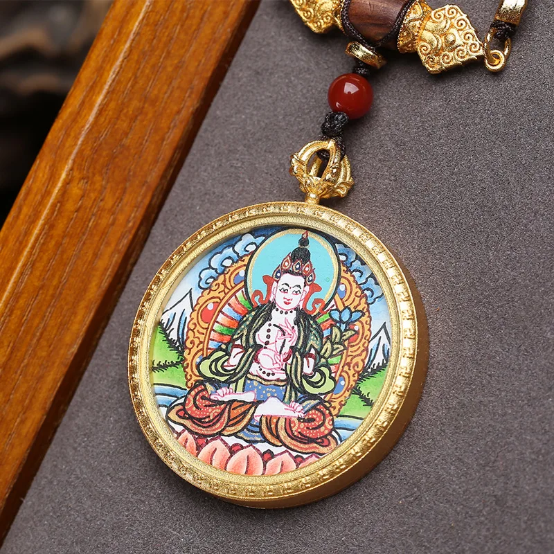 Tibetan-style collectible, hand-painted thangka pendant featuring the Bodhisattva Mahāsthāmaprāpta, with a red agate and coconut