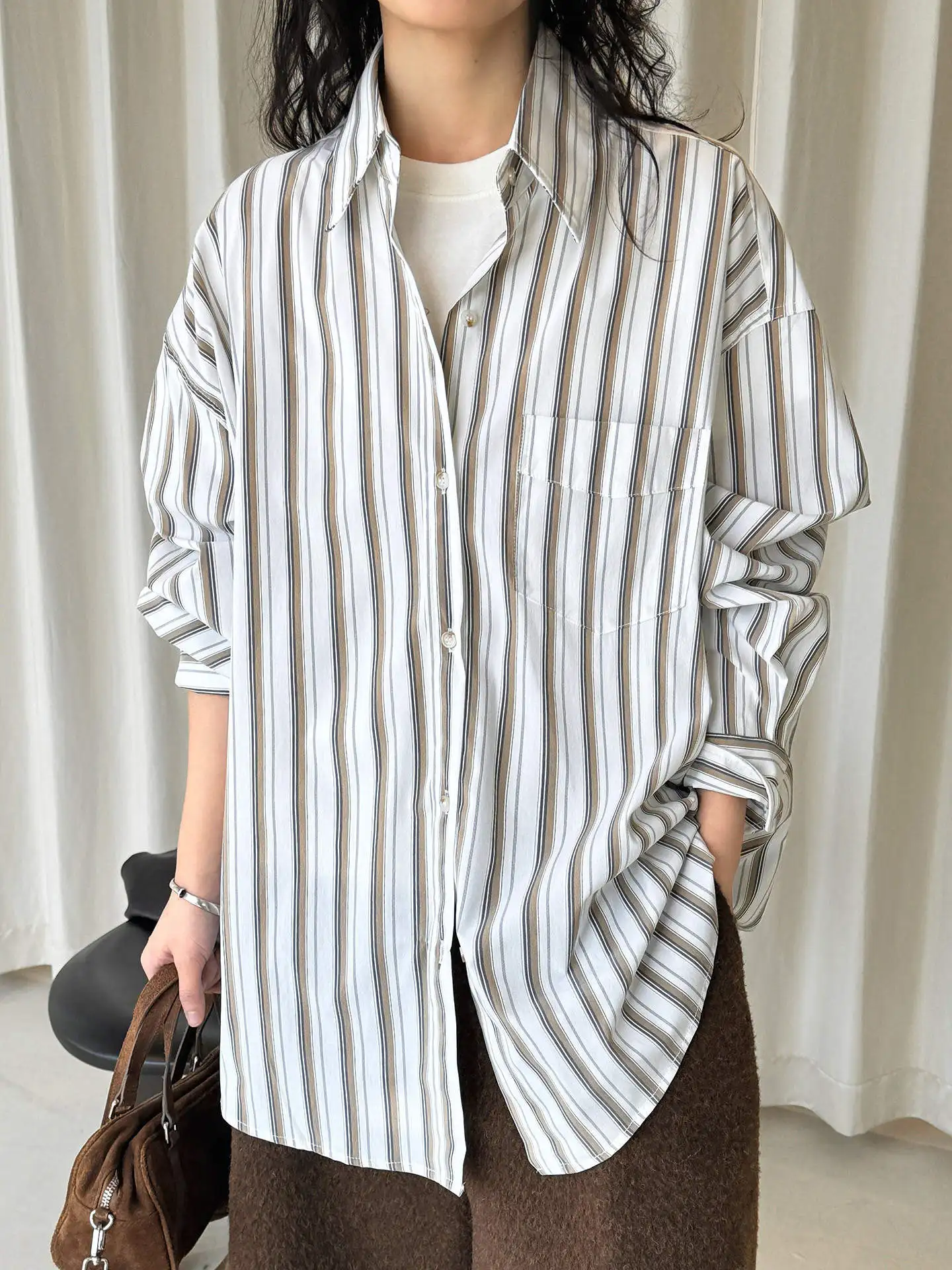 

Early spring new Korean version fashionable and fresh striped shirt loose silhouette slimming casual top for women