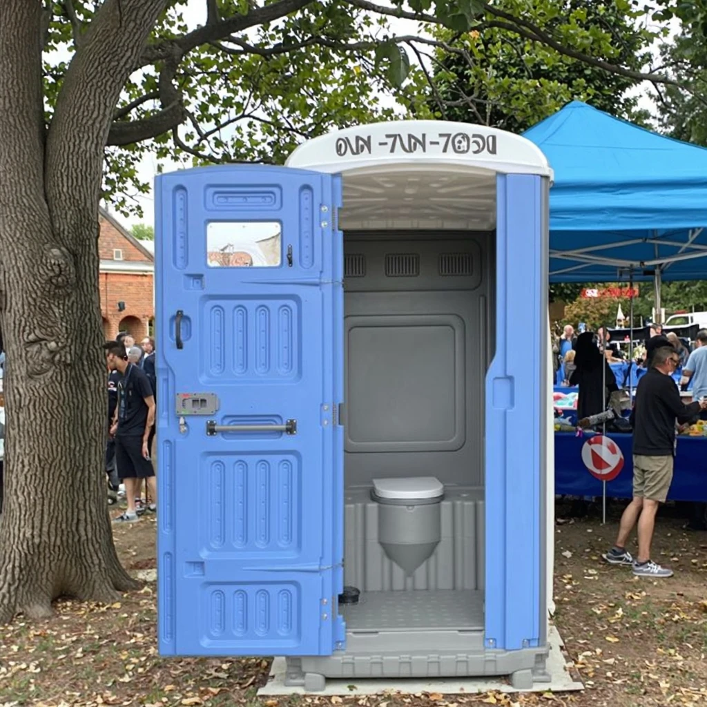 Outdoor temporary portable sanitation facility with built-in sewage tank, urinal and toilet