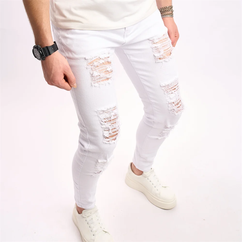 Eleganti fori Distressed Street Style uomo Jeans Skinny pantaloni Slim elasticizzati maschili pantaloni in Denim a matita strappati solidi