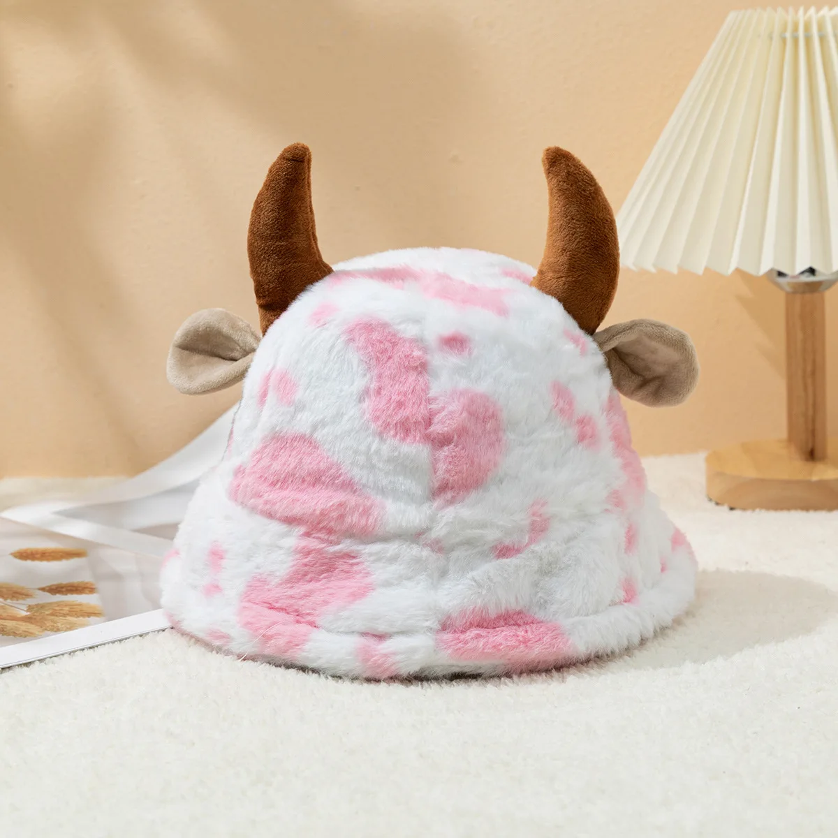 One piece of women's cute cow-print horn-shaped fisherman hat, autumn and winter warm, cold-proof and wind-proof bucket hat