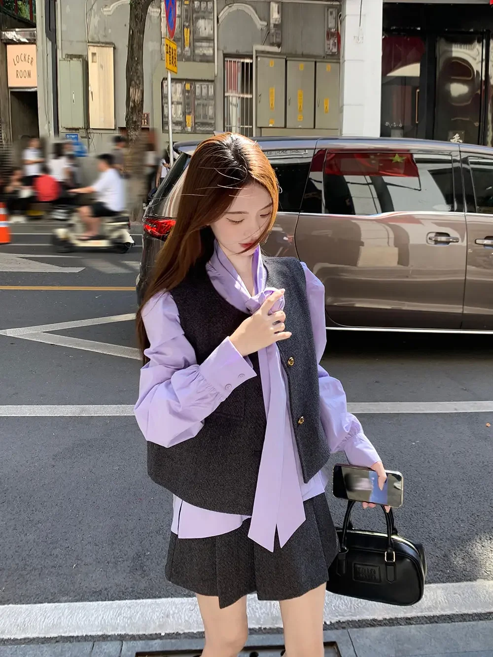 Autunno nuova camicia a maniche lunghe stile college uniforme scolastica coreana camicia viola con scollo a V gilet mezza gonna a pieghe set da tre pezzi