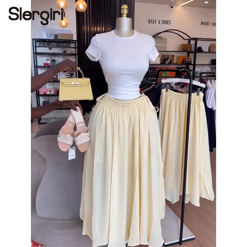 

Slergiri Drawstring Side Elastic Waist Casual Long Skirt Women Fashion New 2026 Summer Vacation Solid Color Big Swing Skirts