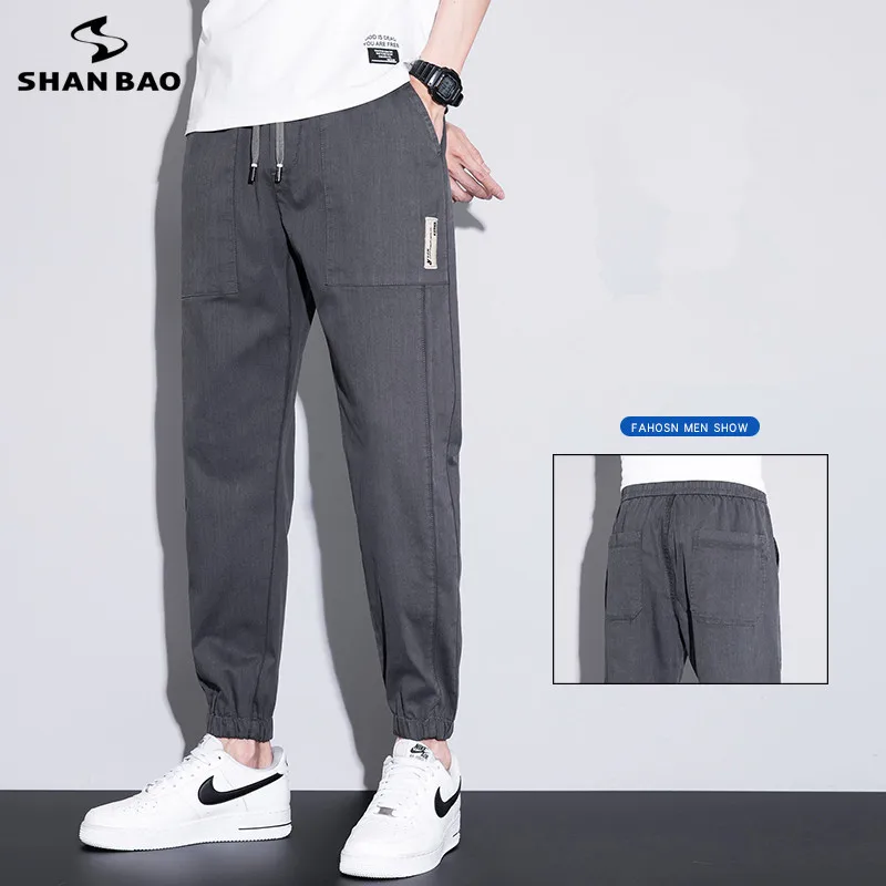 

Japanese men's thin casual pants loose waist nine points sports overalls summer boys jogging elastic waist pants black grey 4XL