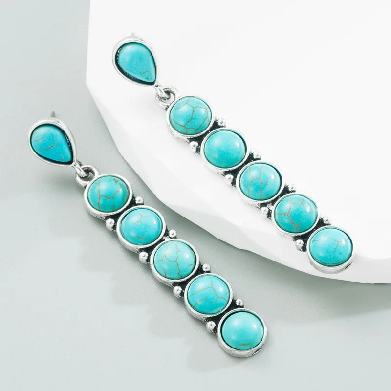 Foreign trade hot sale turquoise earrings women's ethnic style ancient silver round stone creative long banquet earrings