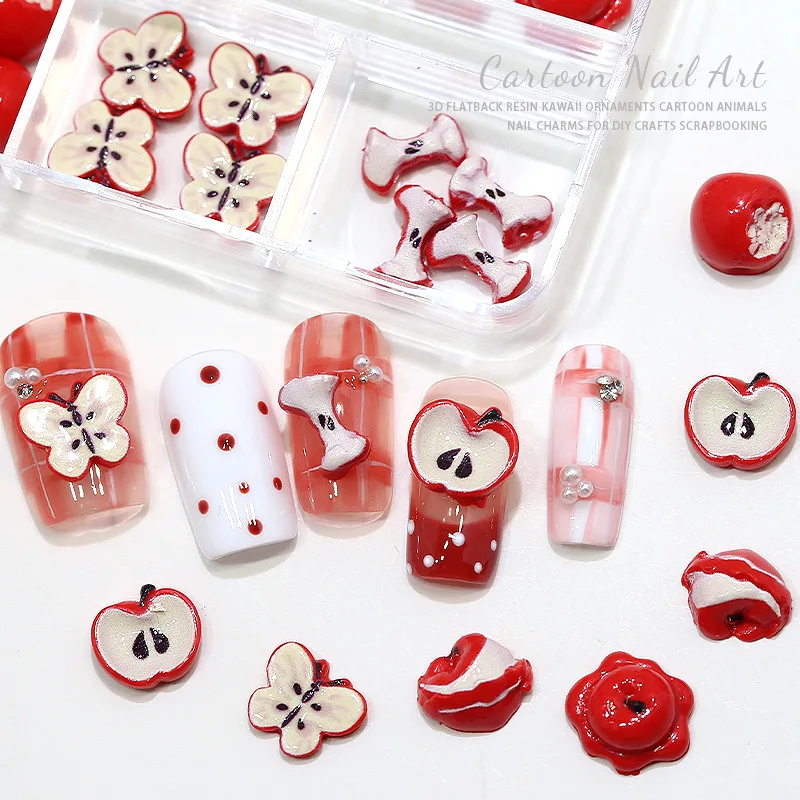 24個入り/箱 3D クリスマス レッド ラッキーアップル 漫画風 噛みつきフルーツスライス ネイルラインストーン デコレーション マニキュア キュートなシミュレーションチャーム