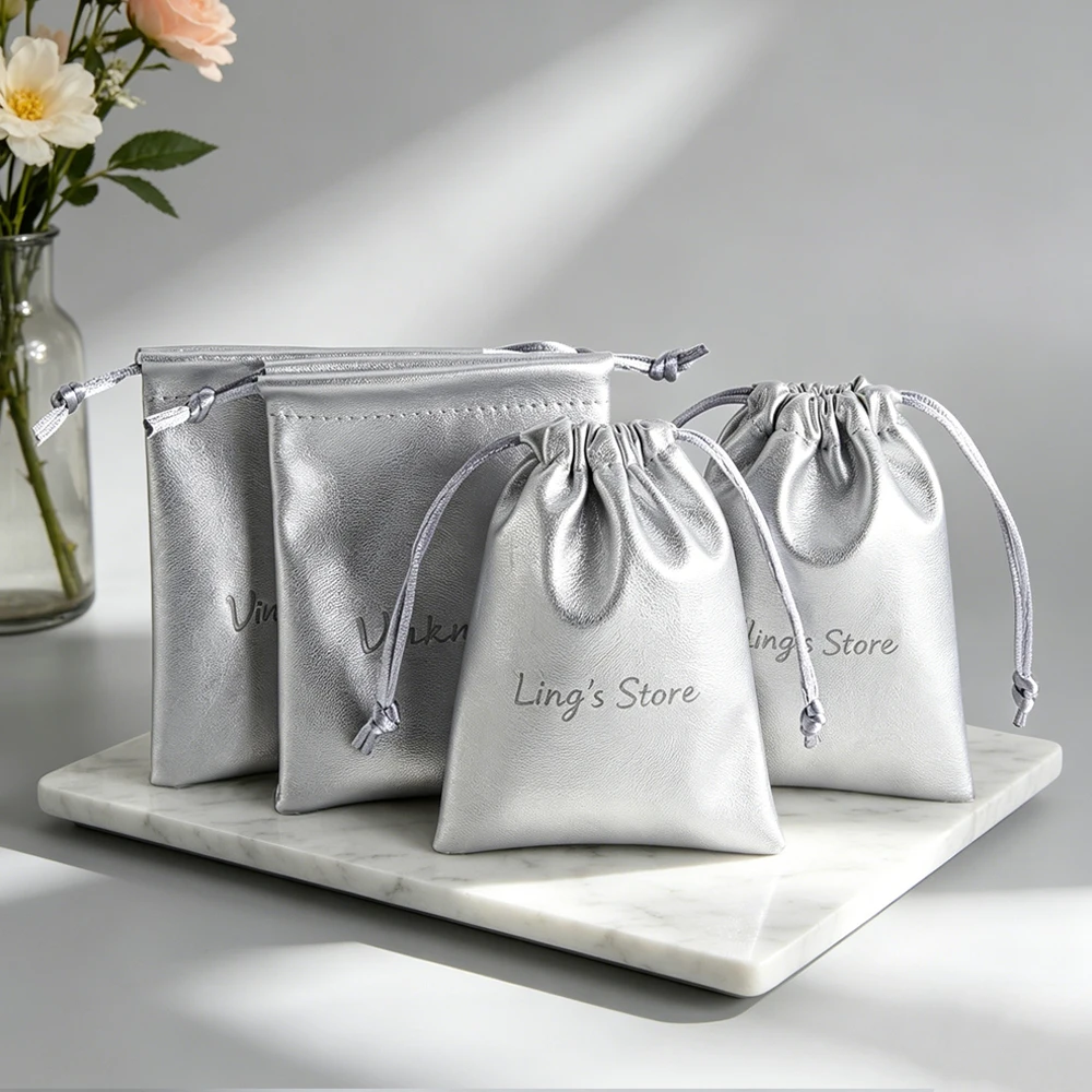 100pcs-personalized-logo-pu-leather-jewelry-drawstring-bag-silver-gift-packaging-pouch-cosmetic-makeup-shopping-candy-organizer