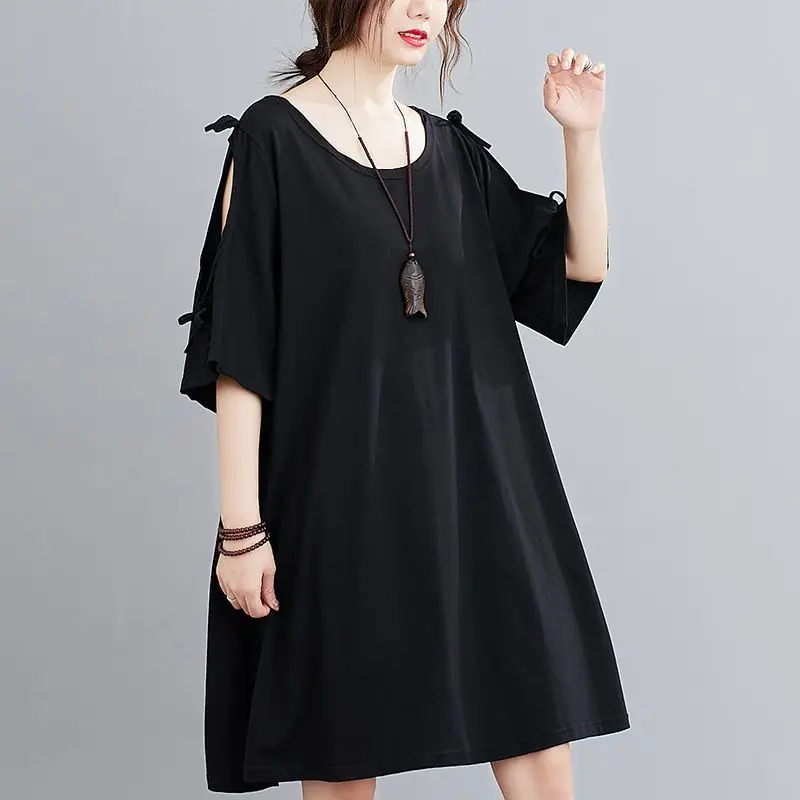 Extra große koreanische Damen version mittellanges, locker bedecktes Bauch-Rundhals-Kurzarm-T-Shirt-Kleid mit kurzen Ärmeln