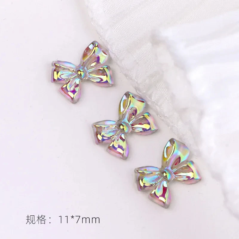 100pcs/Bag Flowing Light Bow Ab Color Ribbon Bowknot Bow Ties French Elegance Ballet Princess Acrylic Nail Charms Decorations