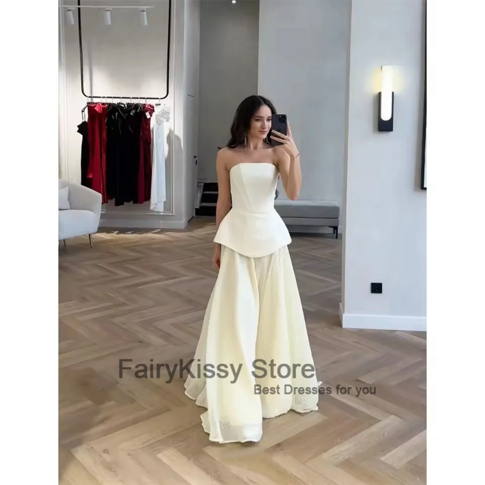 FairyKissy Eleganckie białe suknie balowe bez ramiączek Bez rękawów Linia A Vestidos de noiva Sznurowane suknie wieczorowe do podłogi