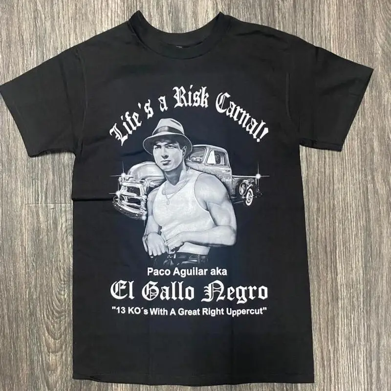 

Paco Aguilar El Gallo Negro Blood in out Sangre por Vatos Locos T shirt
