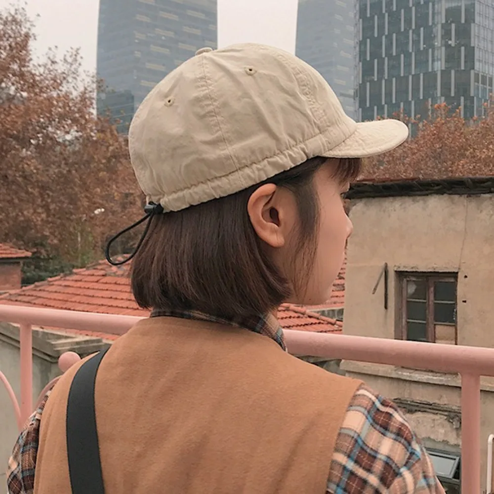

Solid Color Short Brim Baseball Cap Drawstring Adjust Casual Cargo Baseball Cap Japanese Style Sunscreen Peaked Cap Sports