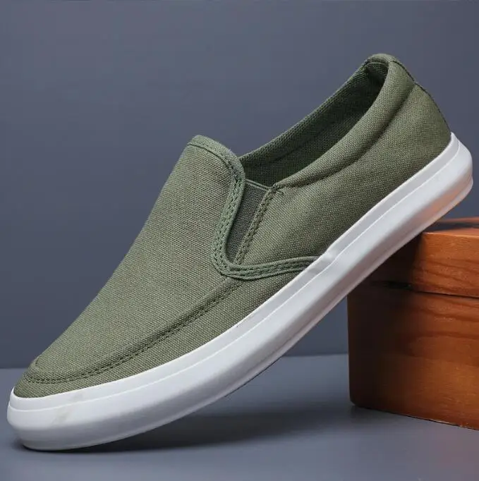 Sepatu kanvas pria, kasual musim gugur baru bernapas lembut Slip-On untuk pria Loafer sepatu nyaman Low-top sneaker