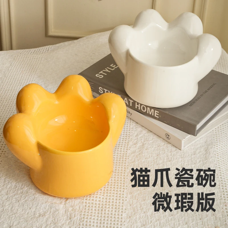 Producto defectuoso: Tazón de cerámica con forma de pata de gato para que gatos y perros beban y coman, previene la formación de manchas negras en la barbilla y protege la columna vertebral.