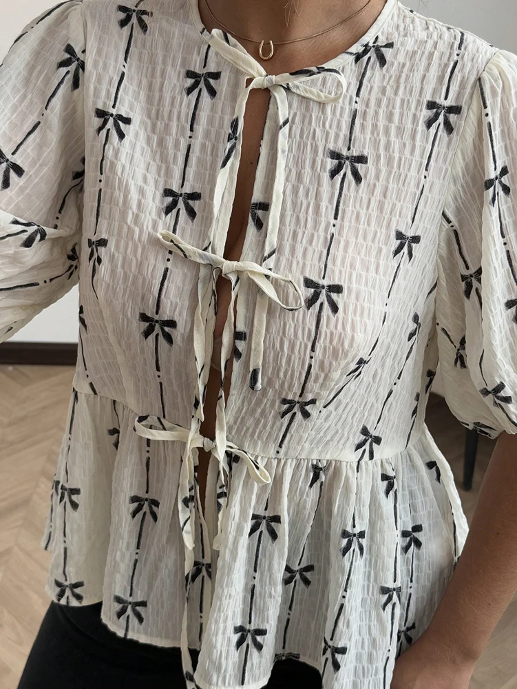 بالإضافة إلى حجم الربيع الصيف رومانسية فراشة عقدة نمط فقاعة كم التعادل الفتاة قميص أنيق المؤنث الموضة