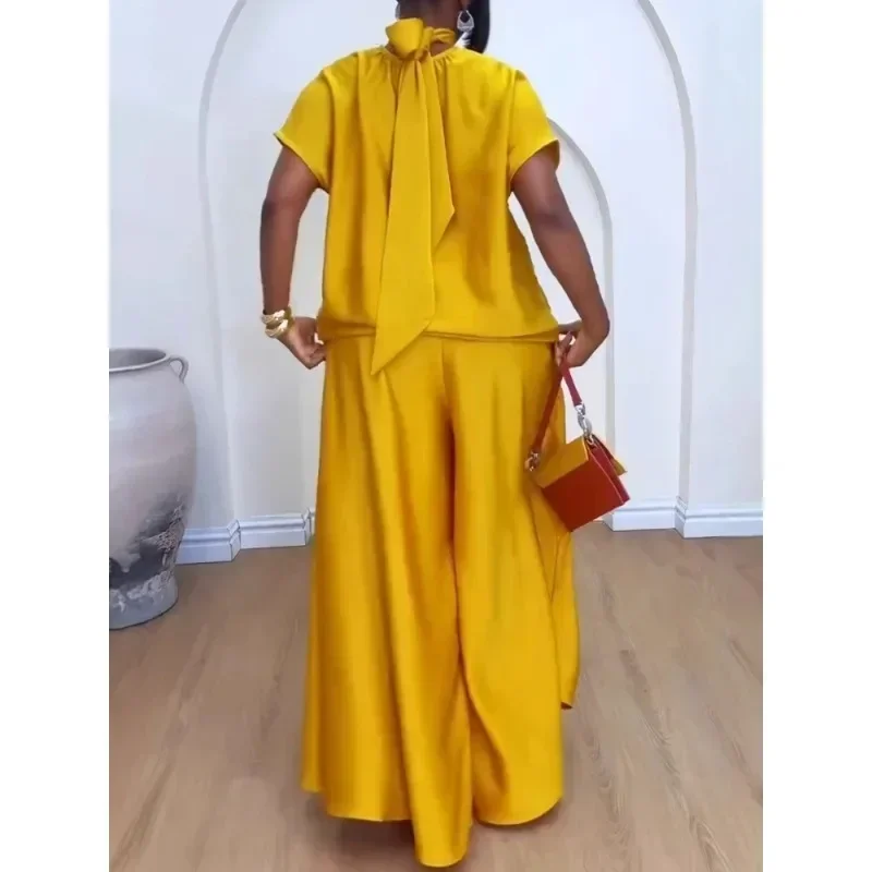 

Yellow Satin Elegant Temperament Women's Loose High Neck Strap Flying Sleeve Top Leisurely Wide Leg Pants Vacation Two-piece Set