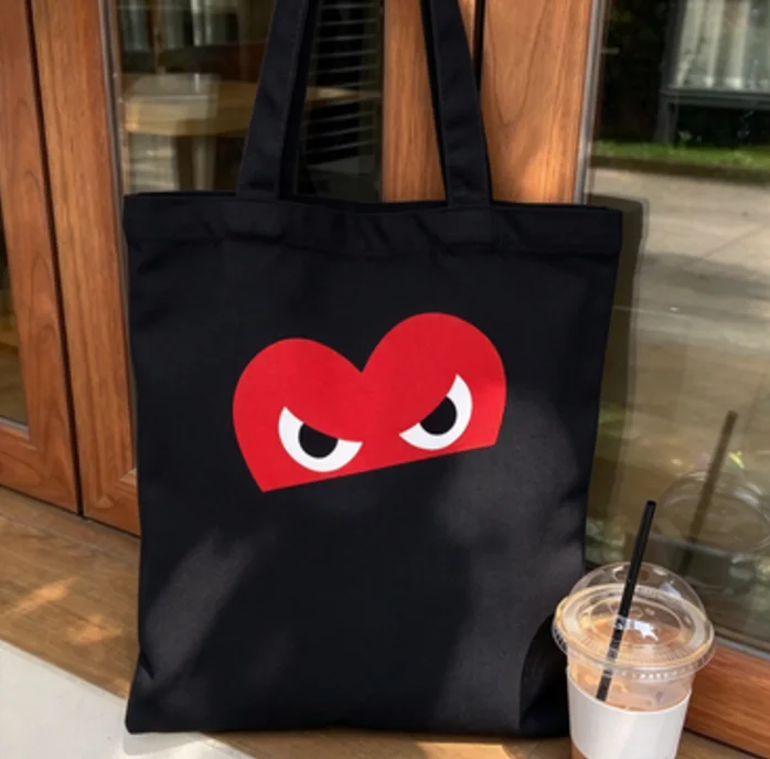 2026 new Best‑Seller‑Trending‑Angry‑Eyes‑Red‑Heart‑Graphic Print High‑Quality Canvas Tote Bag