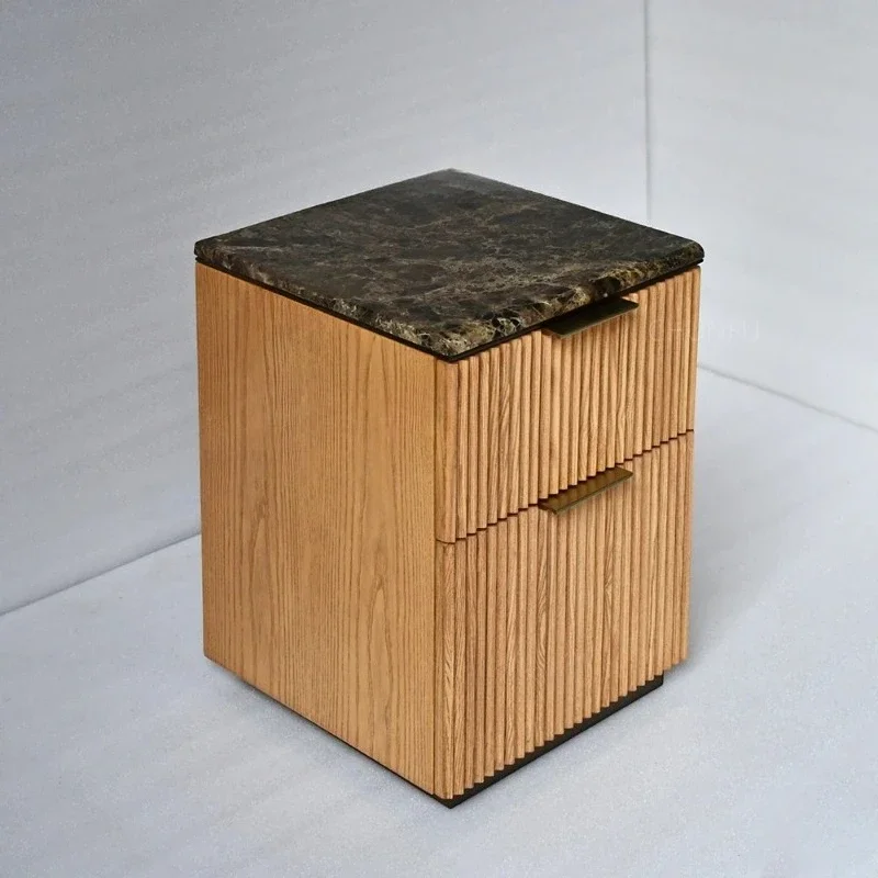 

Modern Italian style solid wood bedside tables with natural marble tops and bedroom or apartment drawers