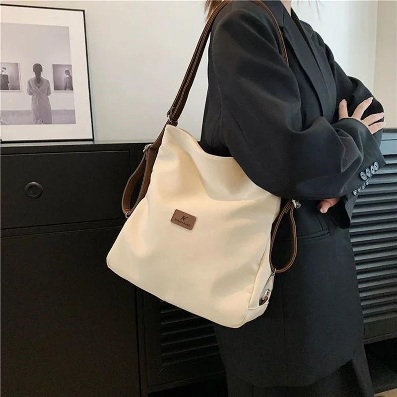 

Women's Canvas Tote Bag High Capacity Minimalist College Style Fashion Versatile Casual One Shoulder Crossbody Backpack