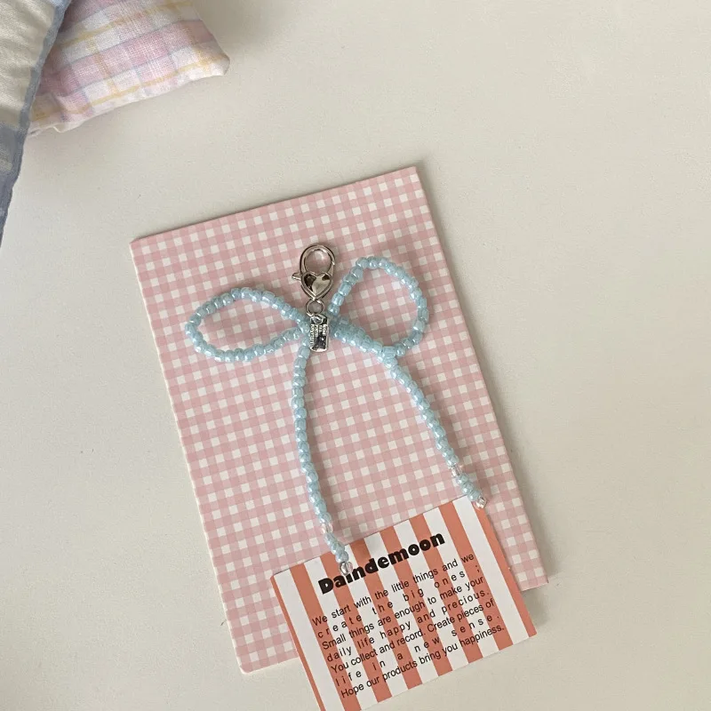 Shining U ちょう結びビーズ電話チェーン 女性用バッグチャームファッションアクセサリーギフト 2個