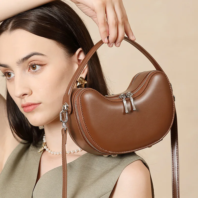 

New niche design genuine leather apple yuanbao bag, super hot summer exquisite hand-held one shoulder crossbody dumpling bag
