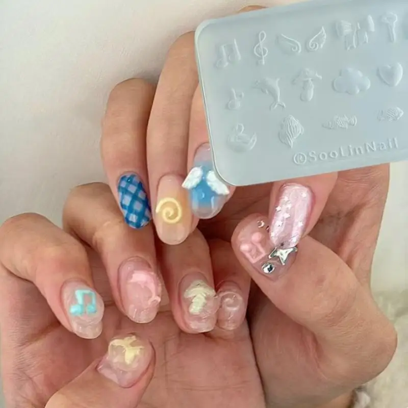 1PC Nail Art Decorazione Unghie Modelli Cucciolo di cartone animato Bowknot Strumenti di progettazione per manicure Y2k Delfino Nota musicale Stampo per unghie in silicone