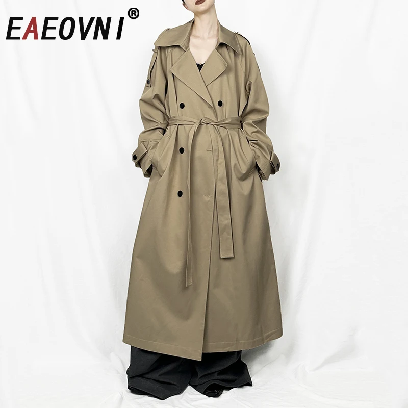 

EAEOVNI Temperament Solid Color Long Trench Coat For Women 2025 Autumn New Belt Double Button Design Windbreaker Office Lady