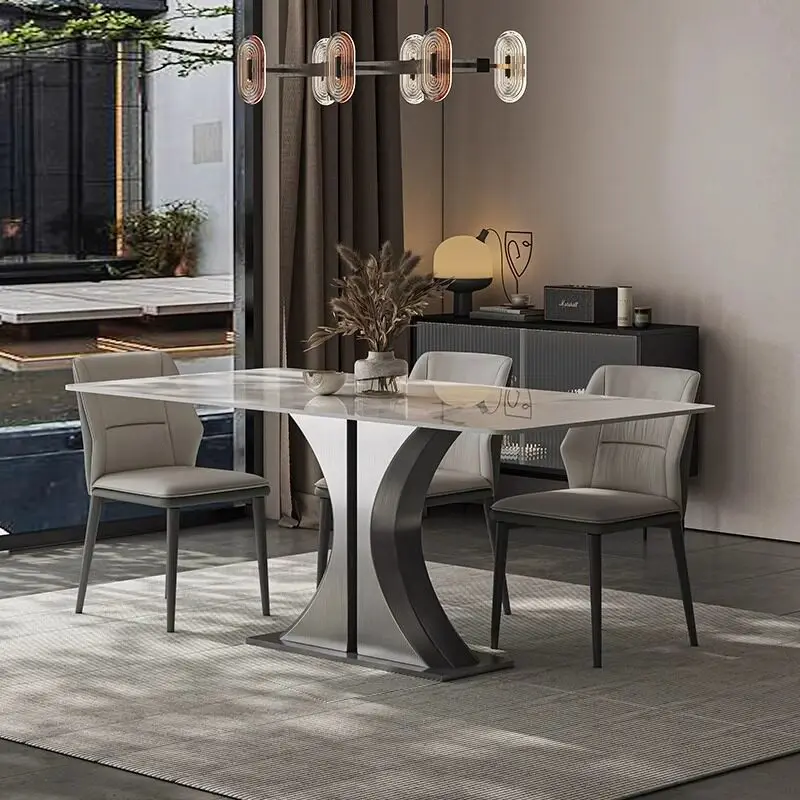 Small apartment modern simple stainless steel high-end rectangular dining table and chair combination