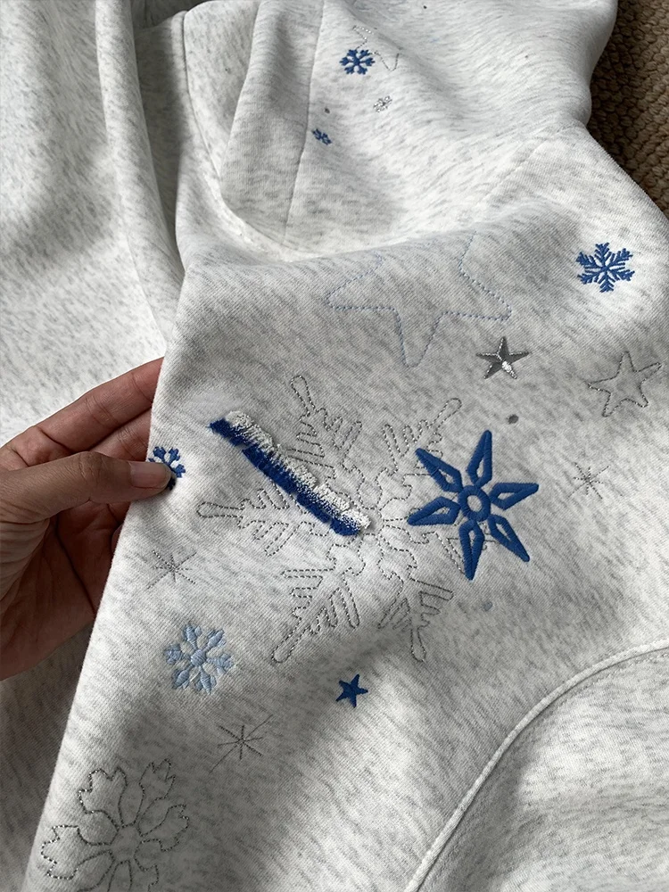 เสื้อฮู้ดปักลายเกล็ดหิมะ ผู้หญิง สไตล์ลำลอง ทรงหลวม ใส่ได้ทั้งฤดูใบไม้ผลิและฤดูใบไม้ร่วง รุ่นใหม่ สไตล์คู่รัก เสื้อคลุมสีขาว สวมใส่สบาย...