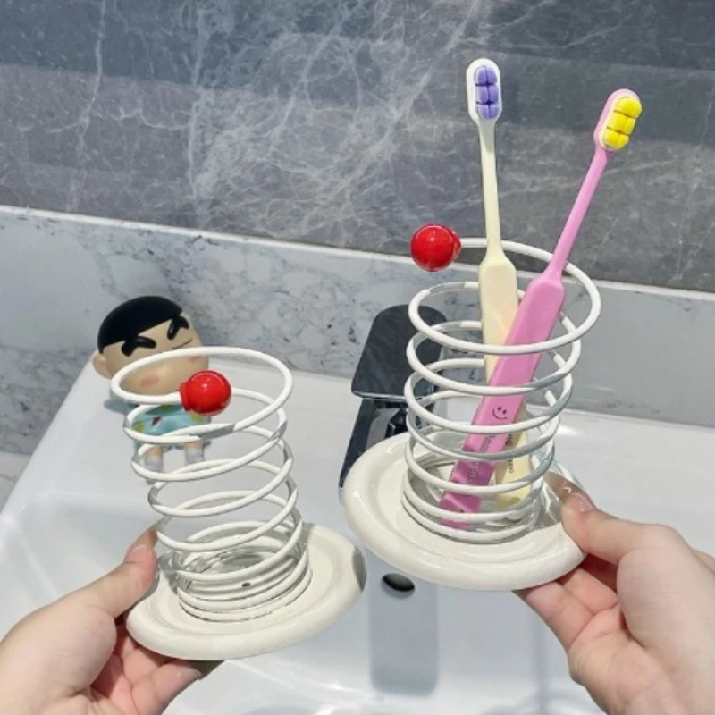 Spring-loaded Bathroom Toothbrush Holder with Water DrainageThickened Material Suitable for Toothpaste Makeup Brushes Combs