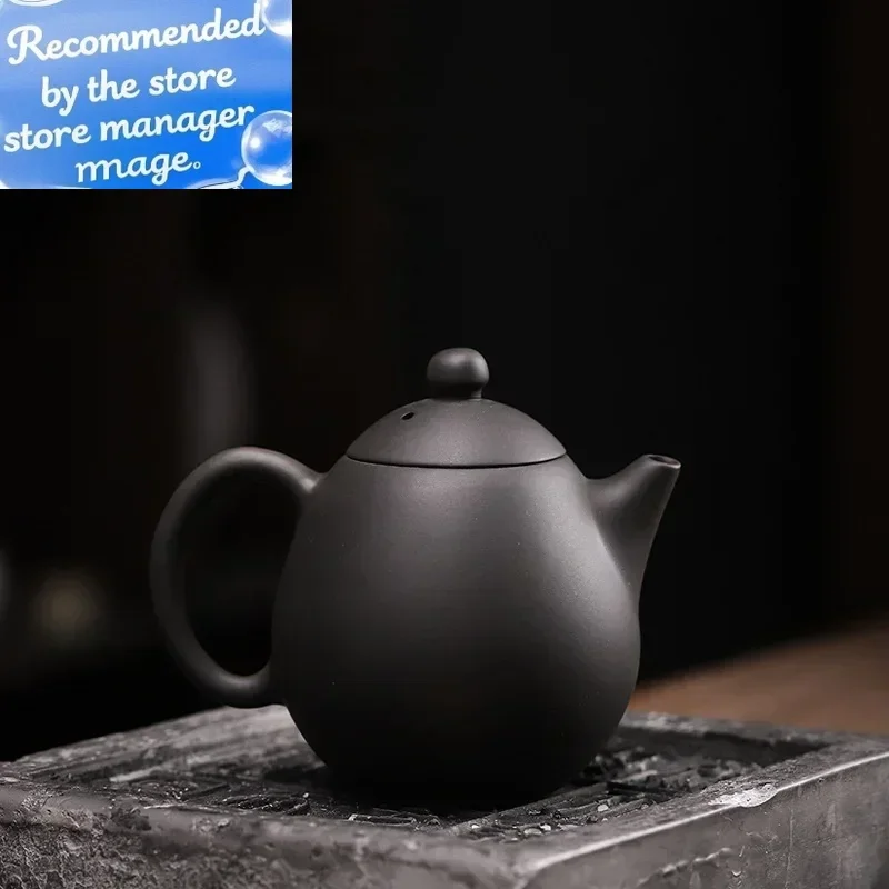 

Qingxi Purple Pottery Lotte Pot Handmade Iron Tire Tea Making Device Long Dan Teapot Single Teapot Ceramic Teapot Siteel
