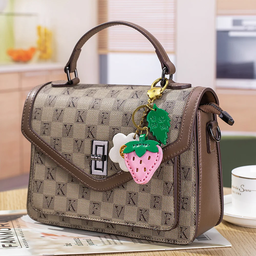 Alirattan 2026 New Style Leather Cute Little Elephant Keychain Creative Fruit Car Key Pendant Cowhide Bag Hanging Decoration