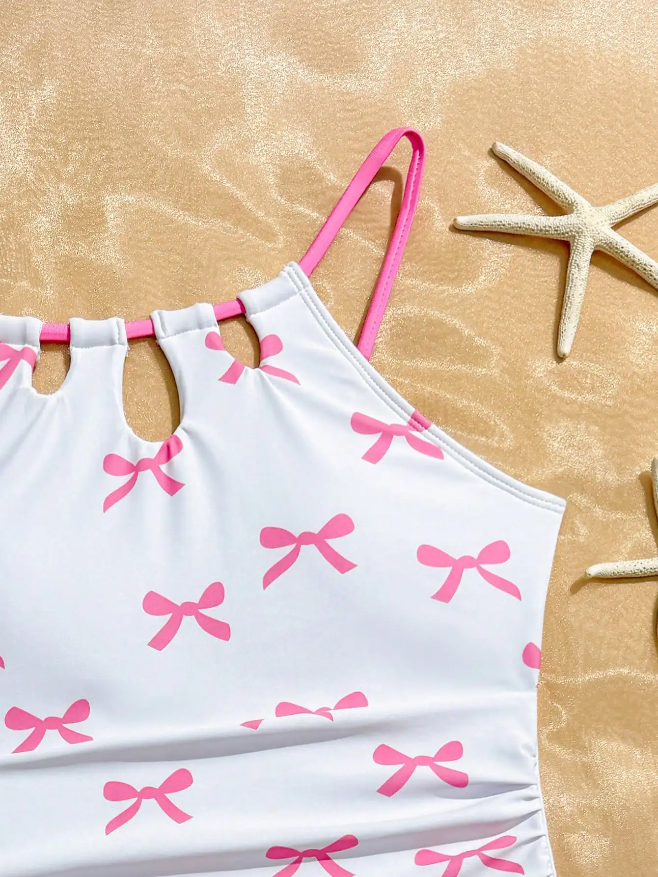 

Women's White One-Piece Swimsuit With Pink Bow Print And Hollow Out Design