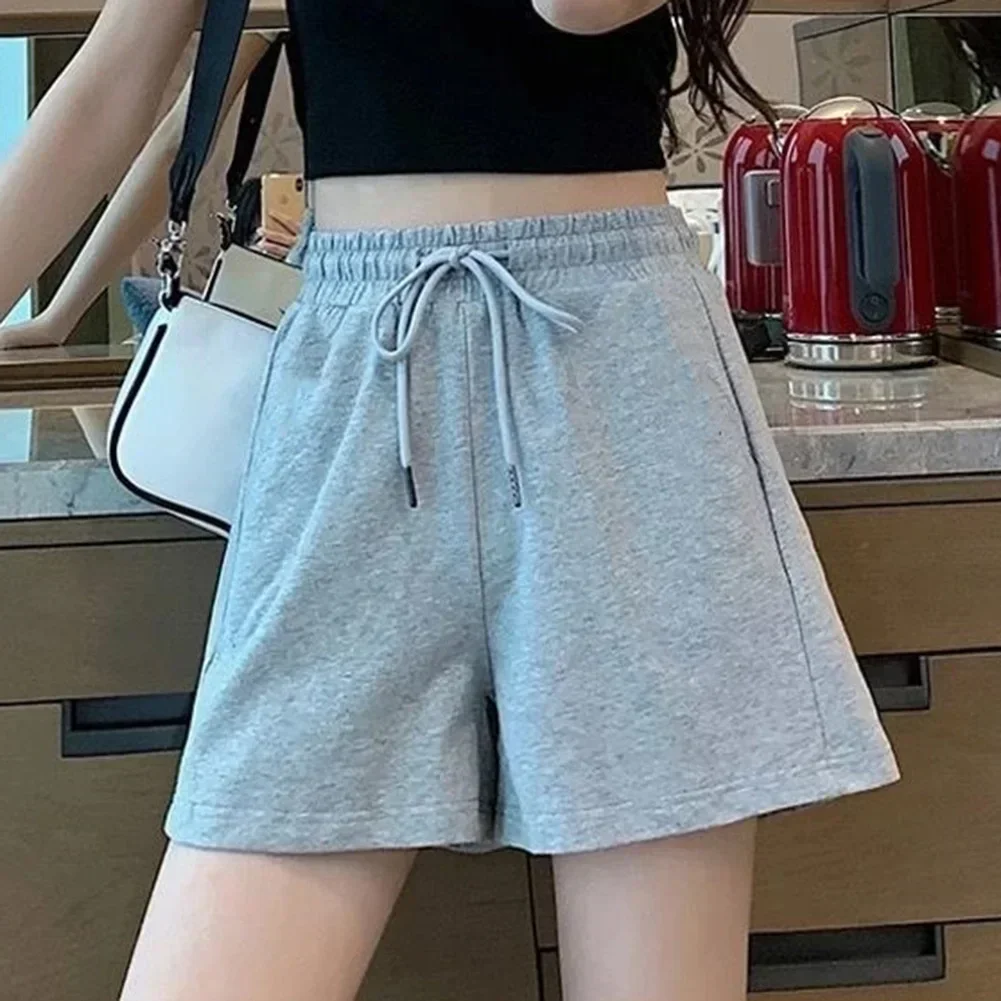 Calções de verão saias femininas elásticas cintura alta casual perna larga shorts coreano uma linha solta mini saia preto calças curtas