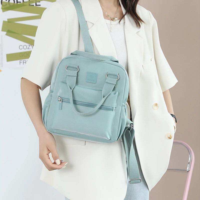 Bolso con asa superior para mujer, mochila de nailon impermeable de estilo coreano, Mochila pequeña de viaje literaria a la moda para niña, 2023