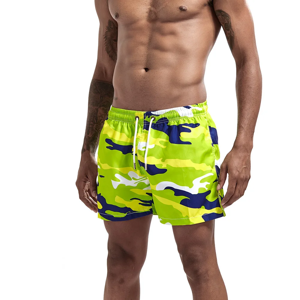 Calças de surf de praia masculinas casuais shorts de três pontos tendência confortável impresso bolso lateral esportes shorts de fitness estilo masculino