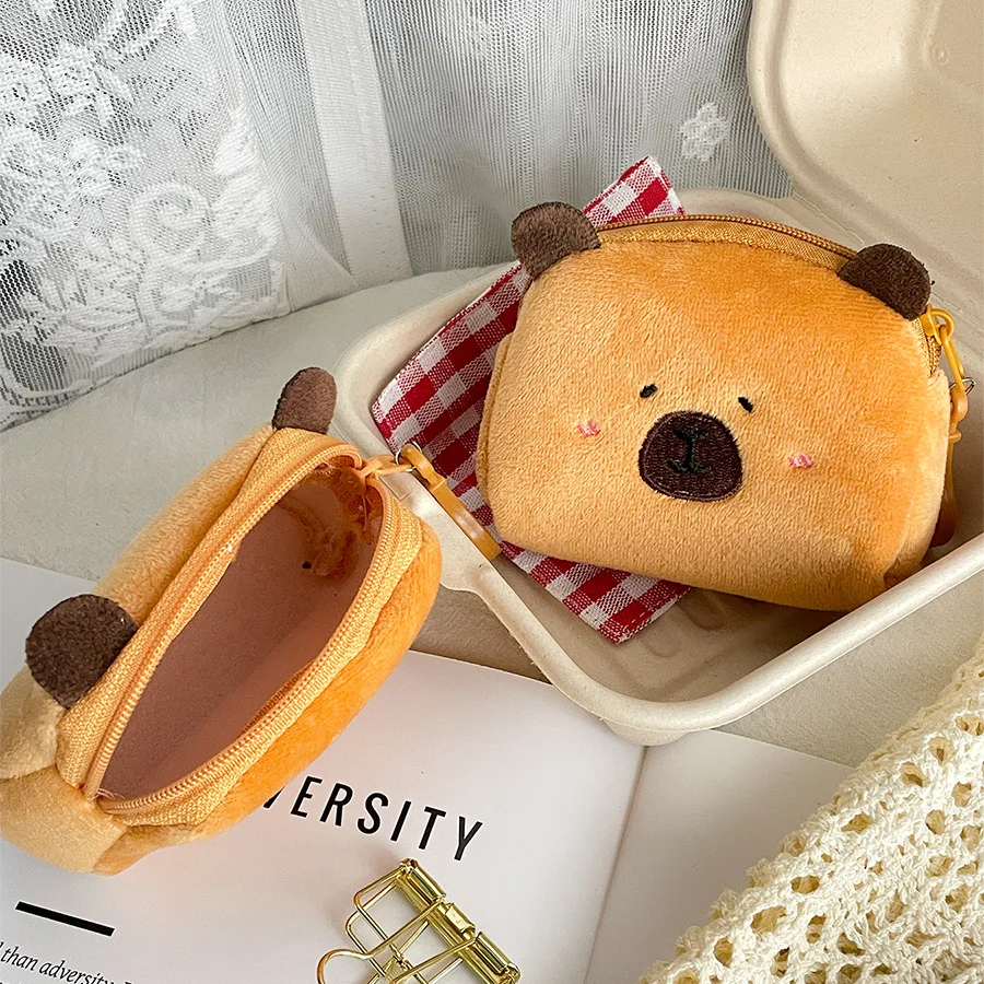 Nouveau créatif Capybara Anime en peluche porte-monnaie belle bande dessinée Capybara en peluche portefeuille fille casque sac de rangement enfants cadeau