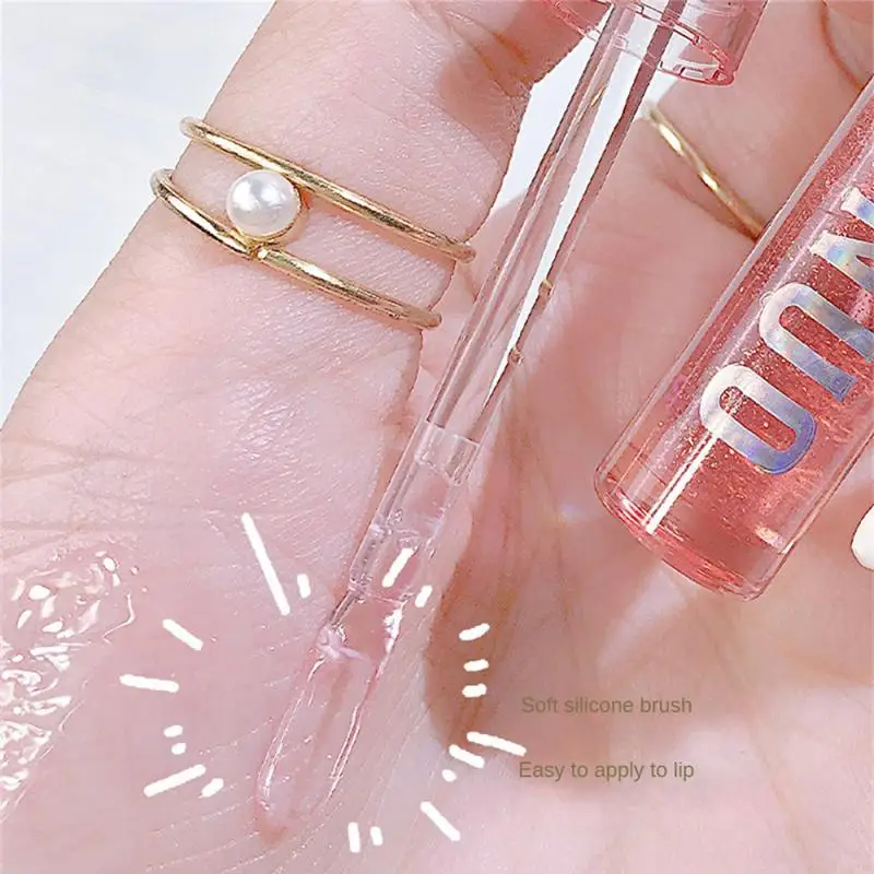 Shimmer Lip Oil 4colos trasparente Fine Flash Lip Gloss Water Glossy Lip Glaze idratante Lip Makeup cosmetici donna