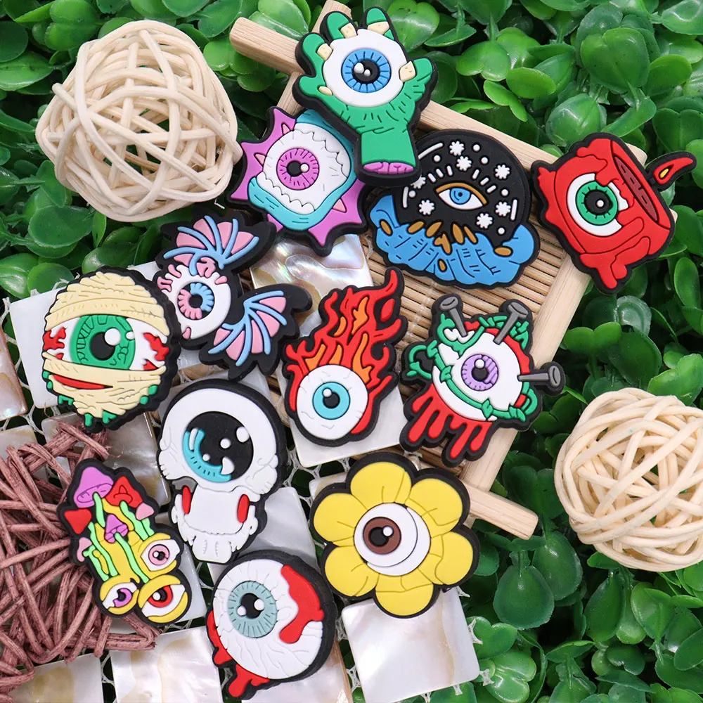 Mix 50pcs PVC Shoe Charms Horrible Eye Flower Candle Mushroom Fire Hand Hole Slipper Decoration Accessories Fit Wristbands