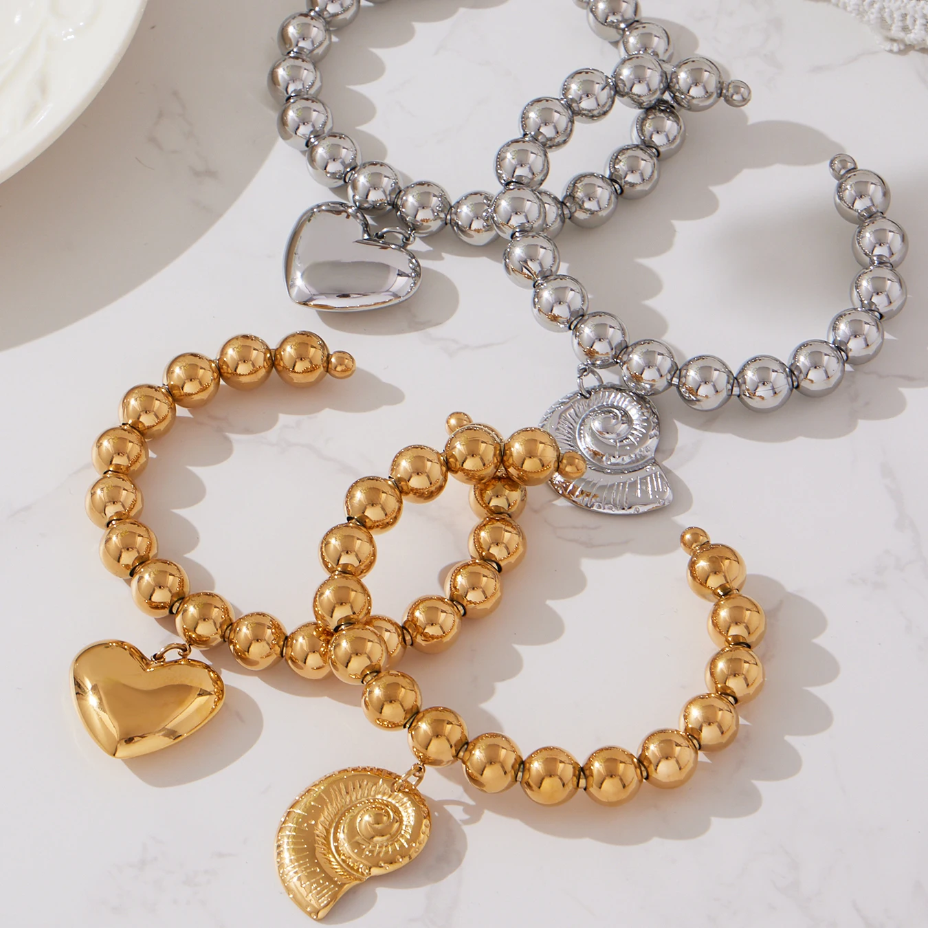 Liora جودة عالية الحلزون القلب قلادة النساء أساور الفولاذ المقاوم للصدأ مصقول الزفاف مأدبة سحر سوار الأفريقي مجوهرات