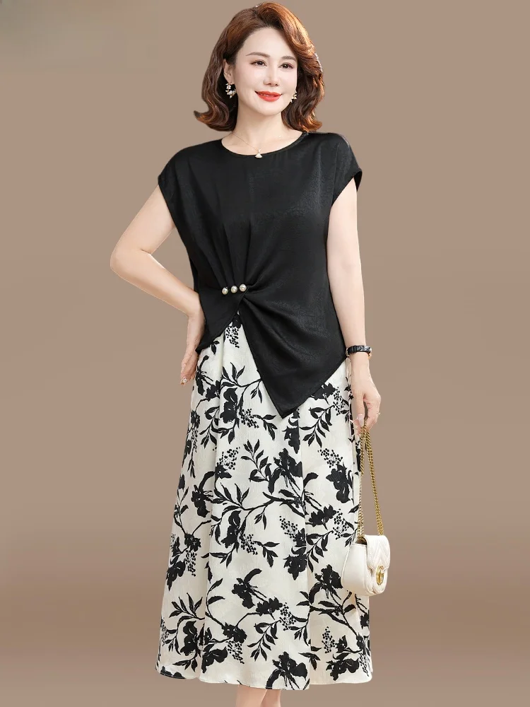 

Модный летний комплект одежды: юбка миди и топ с коротким рукавом для женщин среднего возраста, стильный и модный комплект.