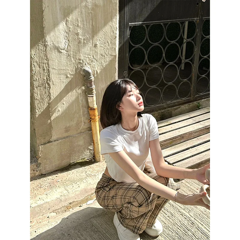 Czysta bawełna lub T-shirt damski letni, dopasowany krój, okrągły dekolt, nieregularny dół, modny streetwear