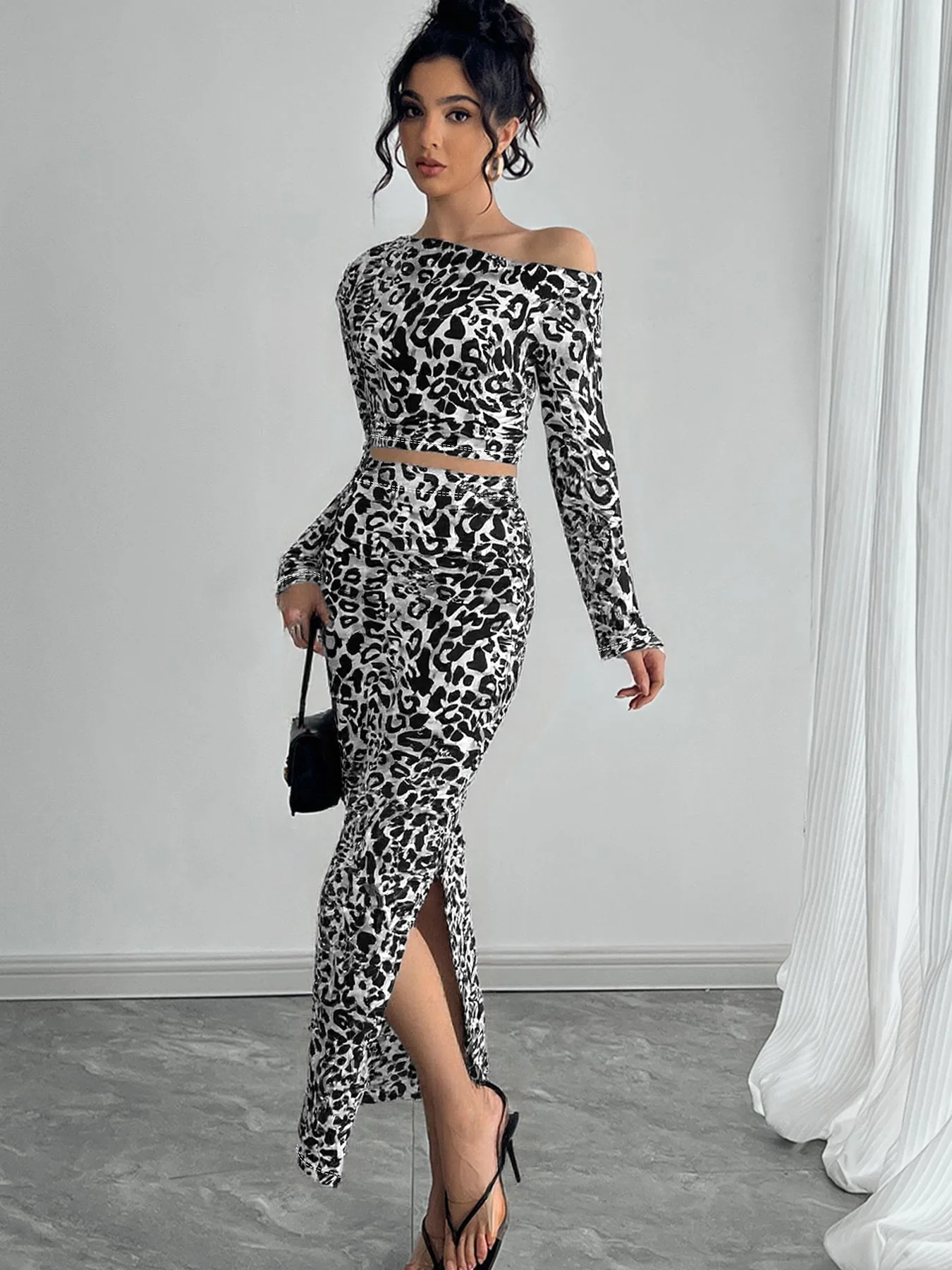 

European and American Spring Festival new women's sexy leopard print two-piece suit with fitted long skirt suit