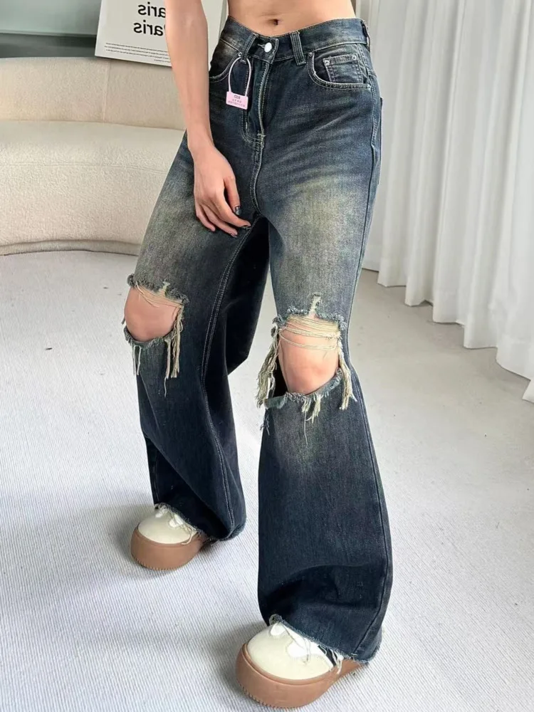 Рисунок 4 - Винтажный дизайн рваных широких джинсов