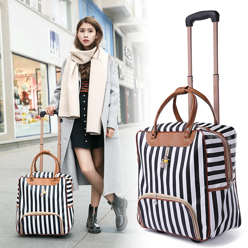 

Large Capaci Women's Travel Bag Handheld ort Trip Lage Bag Korean Sle PU Material with Four-Way Wheels Handbag