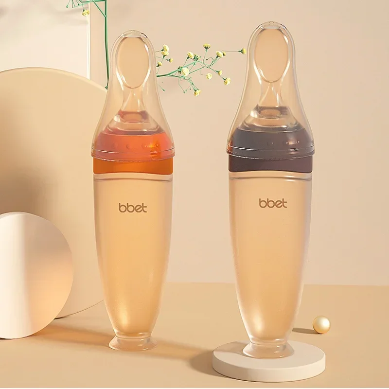 

2pcs Baby Utensils Squeezing Feeding Bottle Baby Spoon Bib Baby Training Rice Cereal Food Spoon Supplement Feeding Accessories