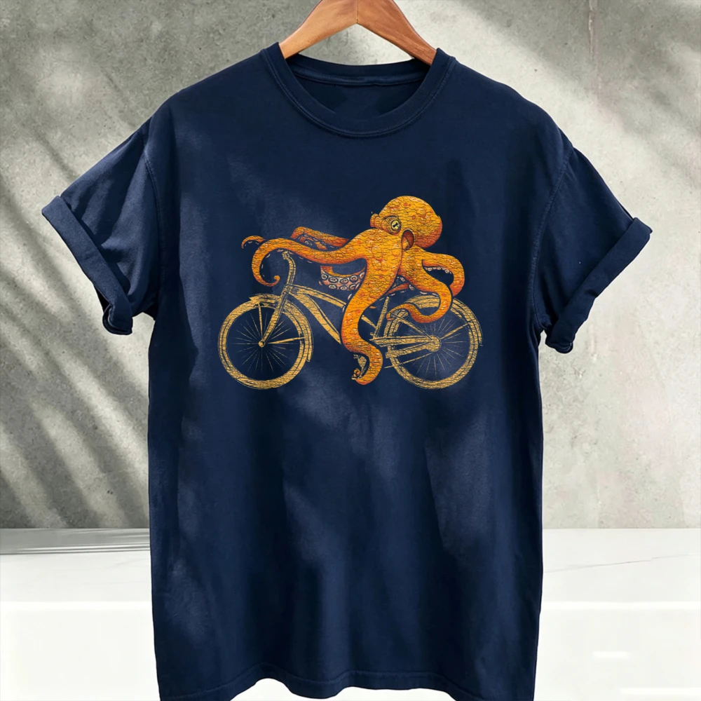 Vintage Octopus Riding Bicycle Graphic T‑Shirt Crew Neck Short Sleeve Tees Funny Sea Creature Bike Print Soft Cotton Casual Tops